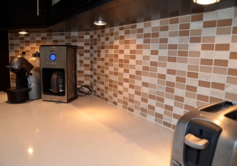 Natural Brick and Glass Backsplash